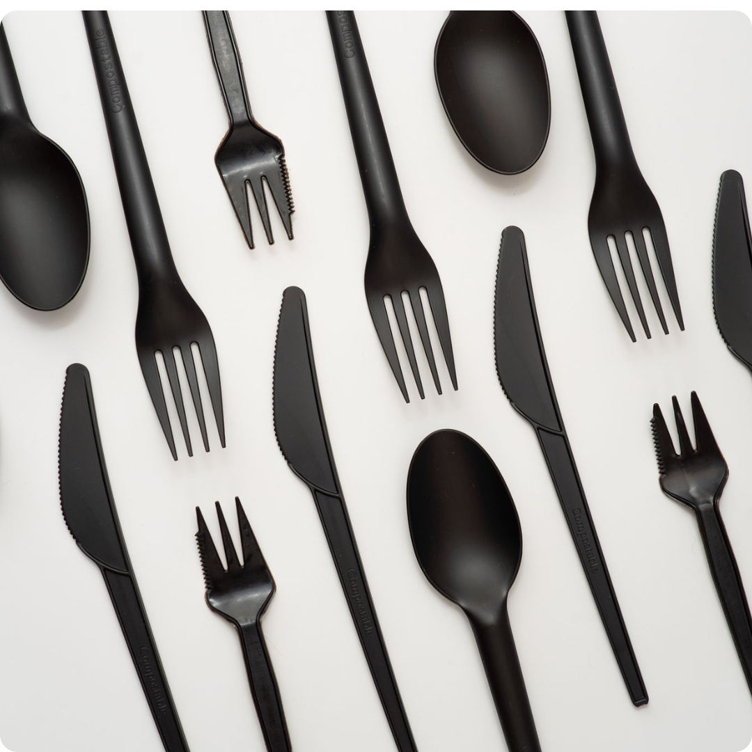 Black compostable PLQ cutlery set with knives, forks, and spoons - Cyclups Plantastiq non-plastic tableware made from wheat